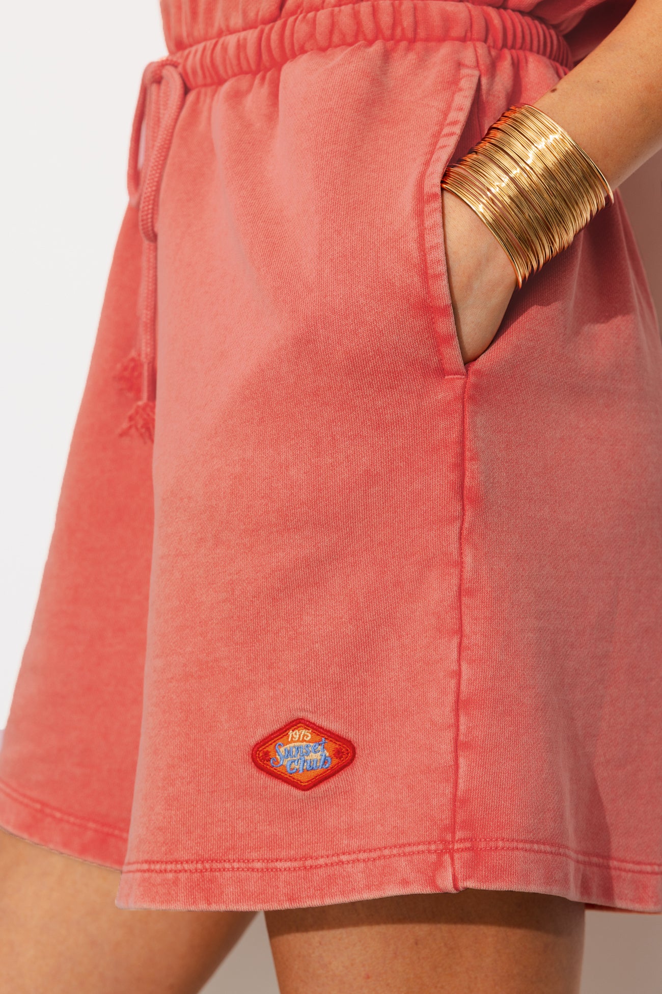 Macacão curto com sweatshirt