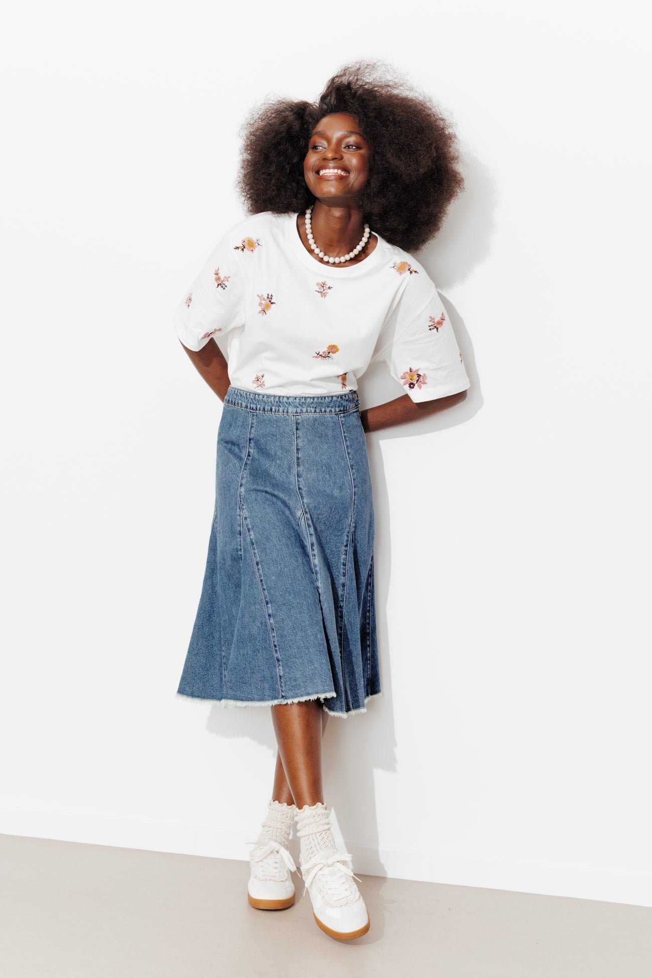 Saia midi de denim