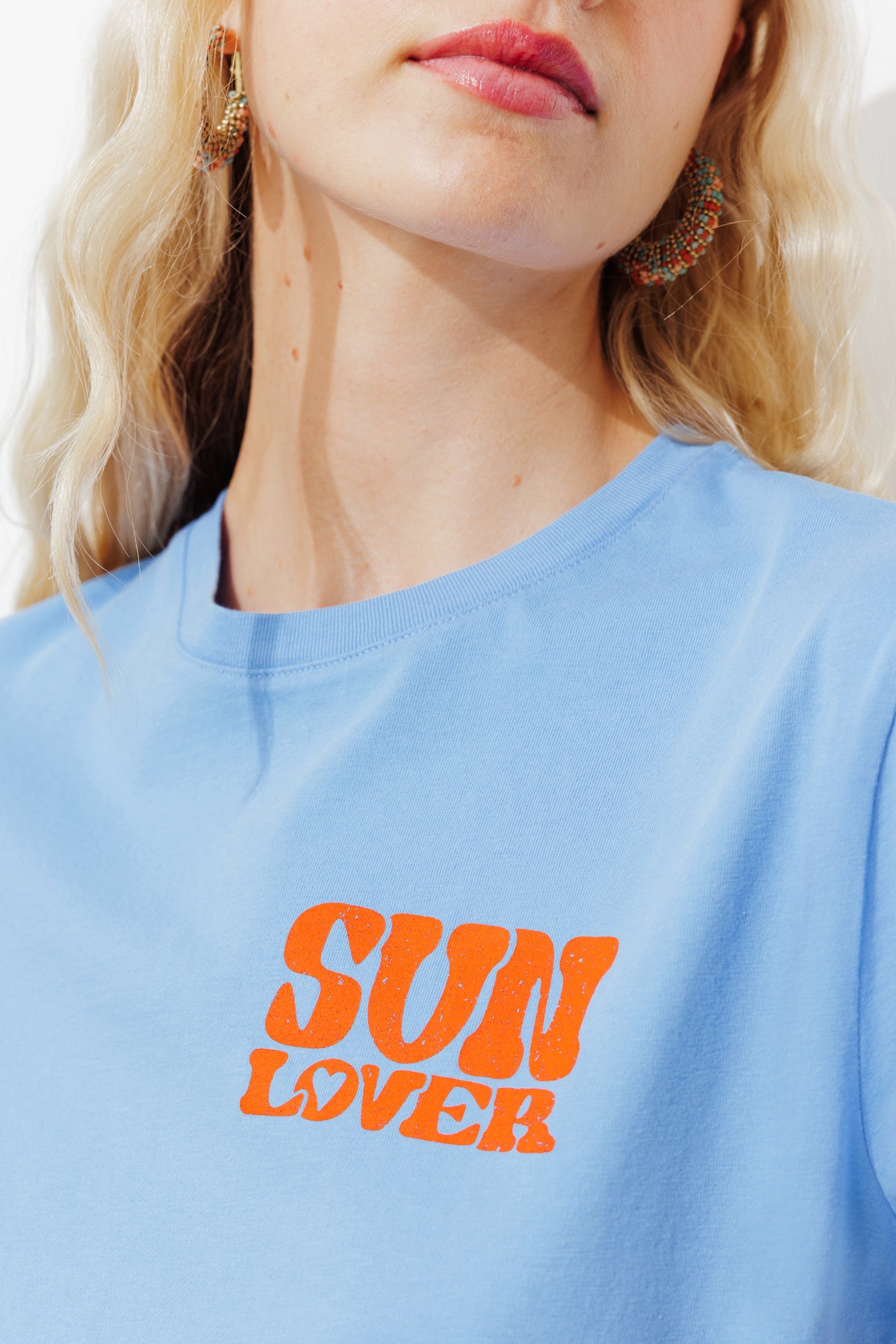 Camiseta com slogan 'Sun lover'